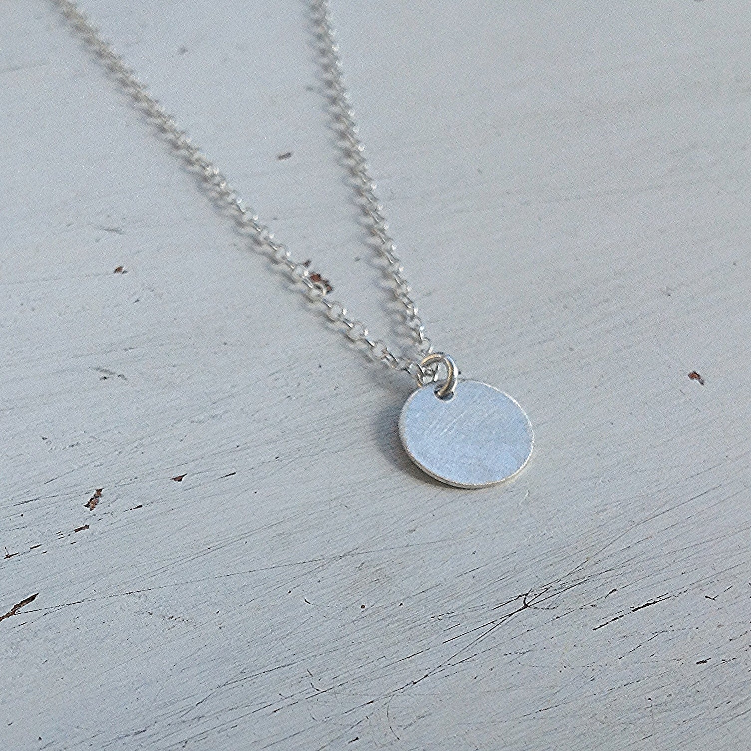 disc necklace