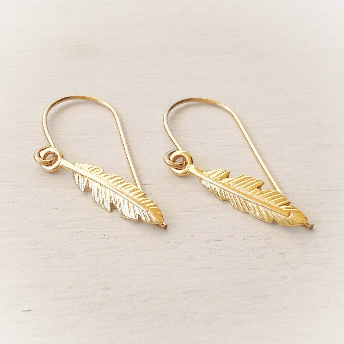 Gold dangle Feather Earrings