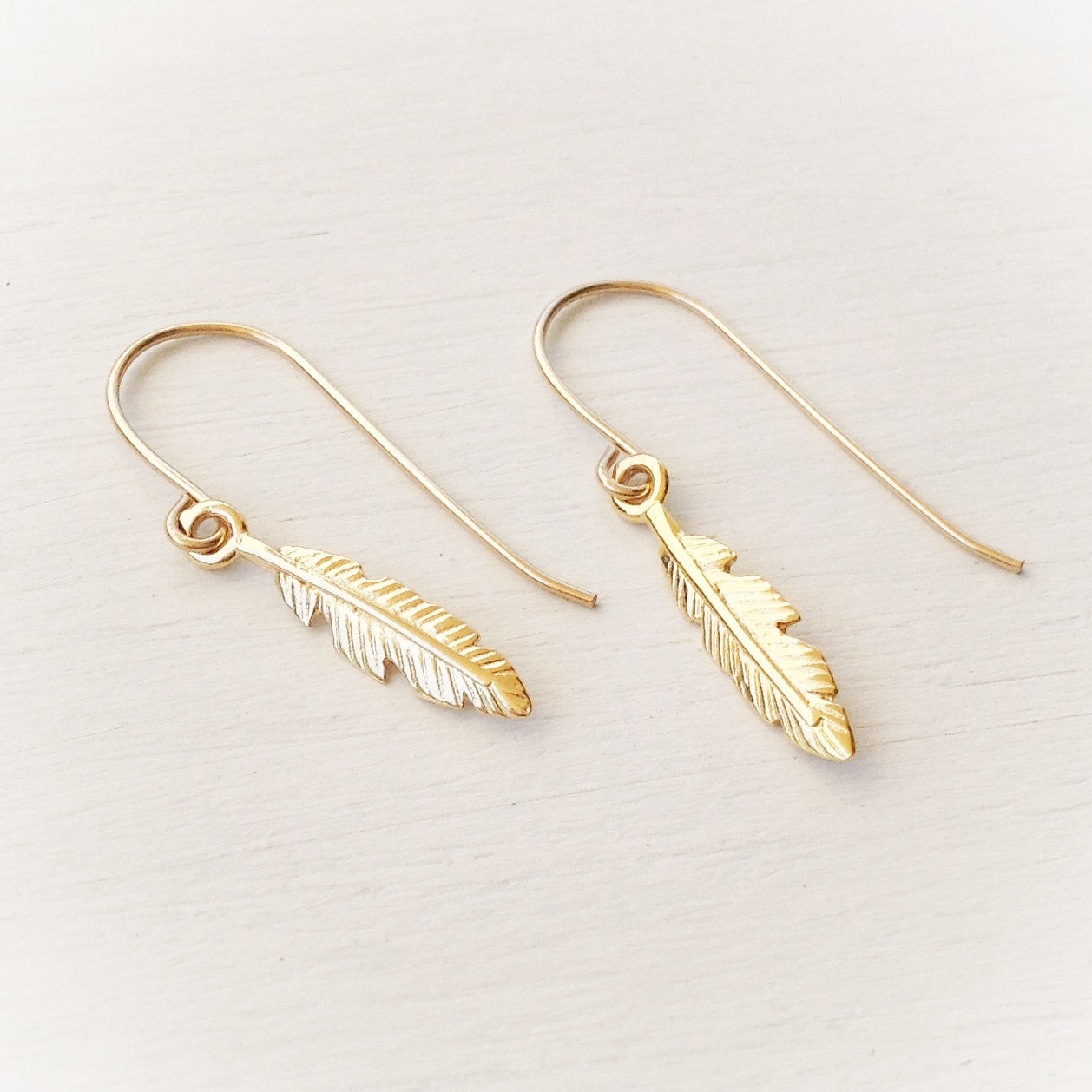 Gold dangle Feather Earrings
